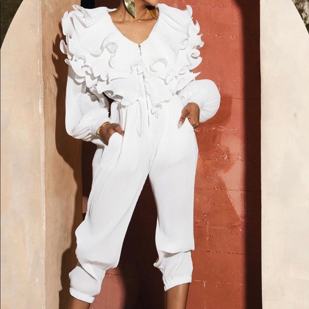 JBollin white Jumpsuit S/M in size.
